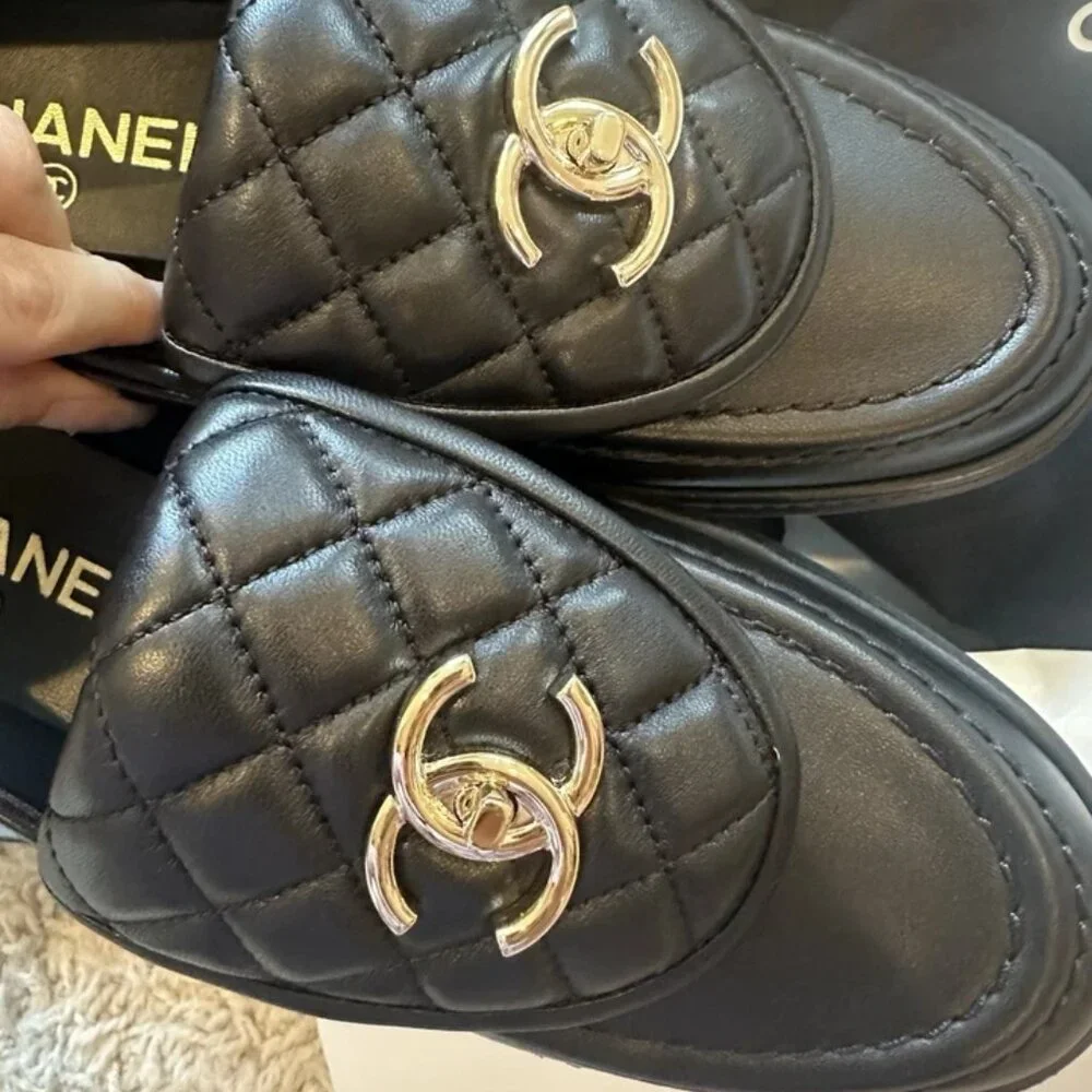 CHANEL Black Quilted Loafers with Gold Accents - Picture 2 of 5